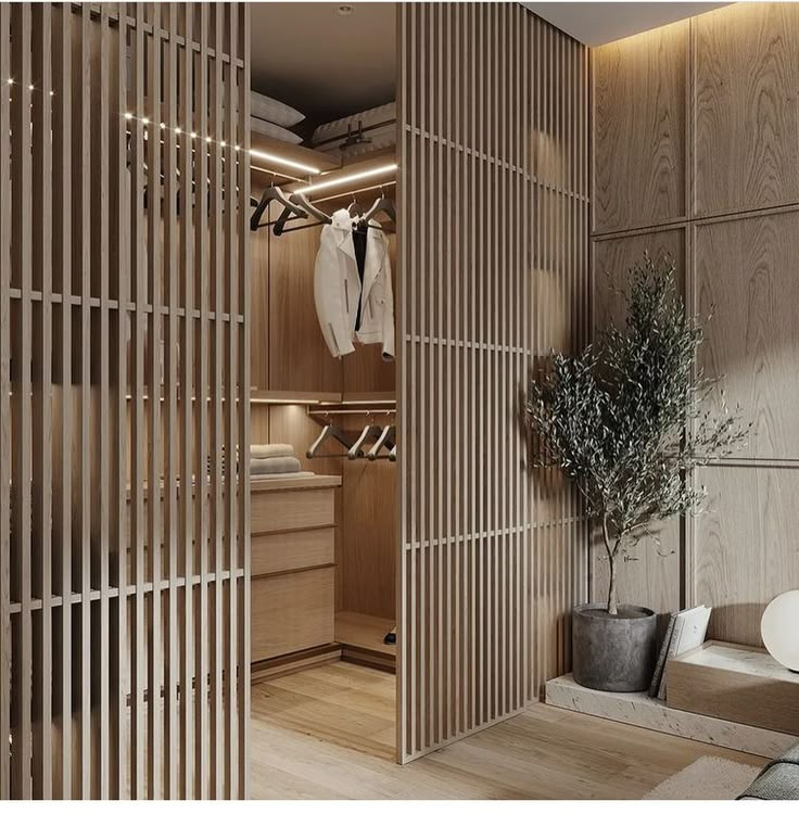 an open closet with wooden slats on the walls