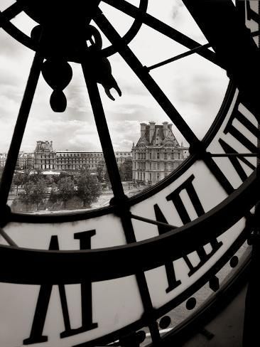 a large clock with roman numerals on it