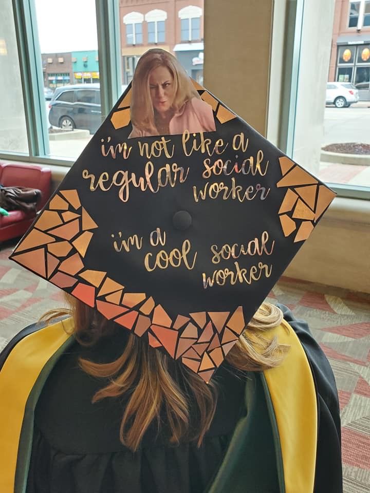 a woman wearing a graduation cap with writing on it