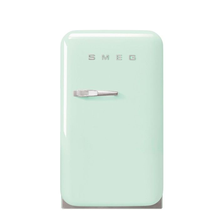 the smeg refrigerator is mint green and has a door handle on it's left side