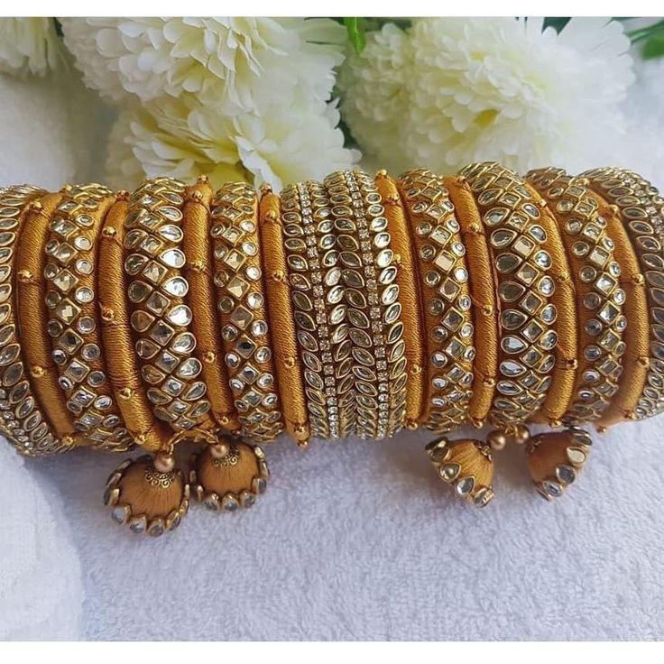 discover stunning bridal, unique bangle designs, and exquisite handmade jewelry. perfect for wedding, festivels, and daily elegance. Bangel Design, Aari Bangles, Jhumka Design, Silk Thread Earrings Designs, Bangle Making, Diy Earrings Materials, Silk Thread Bangles Design, Silk Bangles, Creative Videos