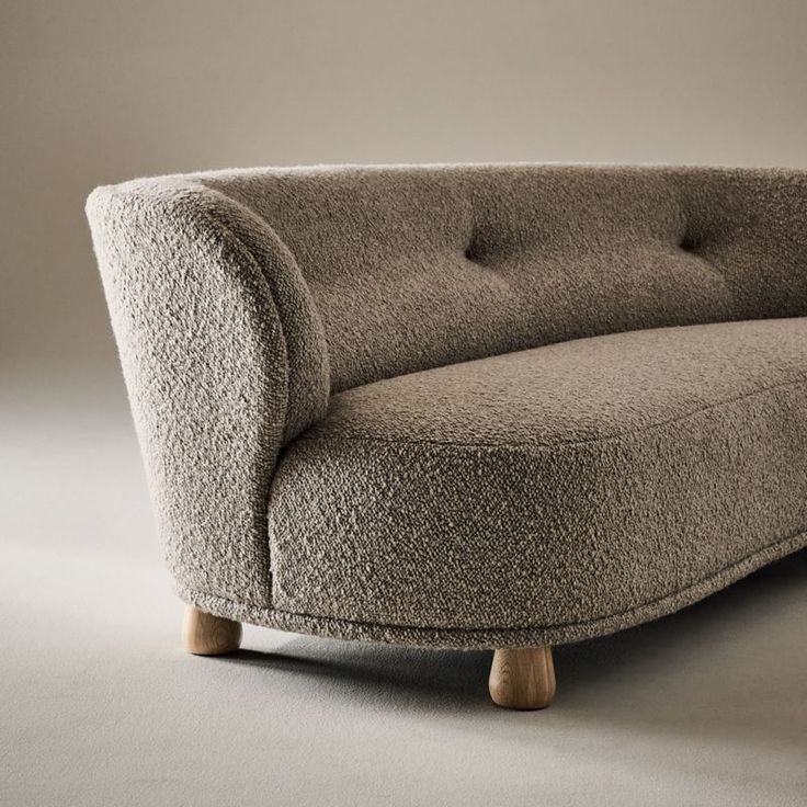 Generously cushioned to hug you as you sit, the Leonne long settee by goop features soft curves of custom wool-blend boucle for a grand statement on a small scale. The sweeping curved back, tufted buttons and teardrop-shaped American white oak legs certified sustainable by the Forest Stewardship Council r FSC come together for a piece that is elevated and timeless. Designed for small spaces, the sophisticated settee is also perfect for creating intimate seating in larger rooms. CB2 exclusive.  - Boucle Sectional Sofa, Natural Linen Sofa, Precedent Study, Love Seat Sofa, Leather Sectional Sofa, Showroom Design, Old Fashioned Glass, Curved Sofa, Linen Sofa