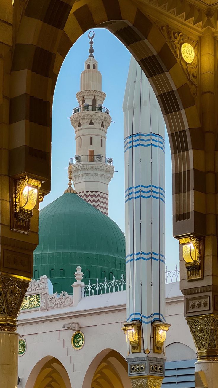 the inside of a building with an arch and dome on it's side, in front of other buildings