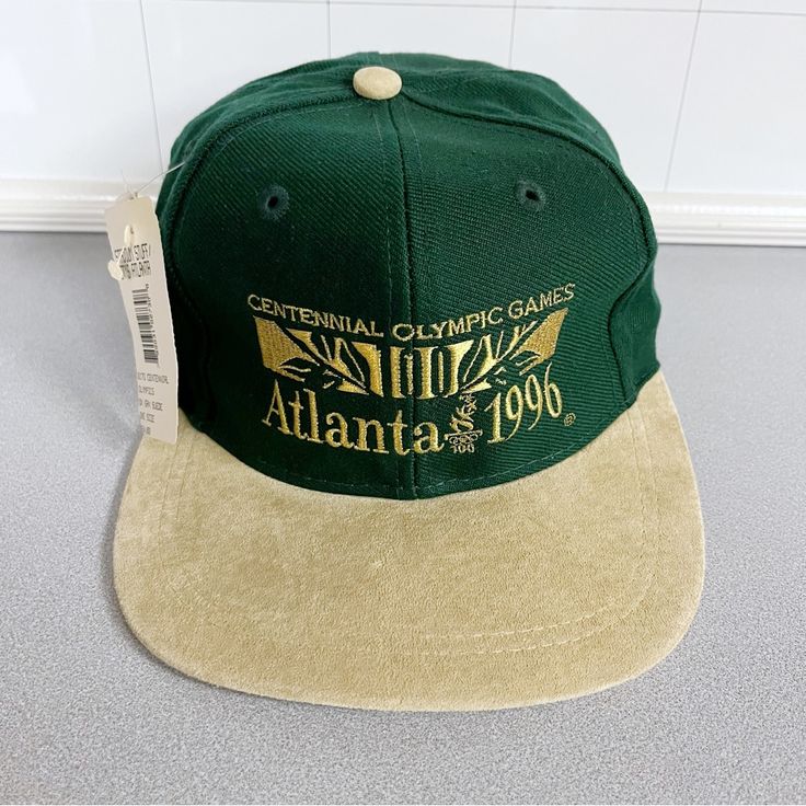 Vintage Atlanta 1996 Olympics Snapback Hat Green, Centennial Games Rare New! New With Tags Green With Brown Suede Brim Please Use Pictures For Reference Shipped With Usps Please Contact Me With Any Questions, Thank You! 1996 Olympics, Bowl Hat, Chicago Bulls Snapback Hat, College Hats, Cowboy Buckle, Vintage Atlanta, Wyoming Cowboys, Fastpitch Softball, Head Gear