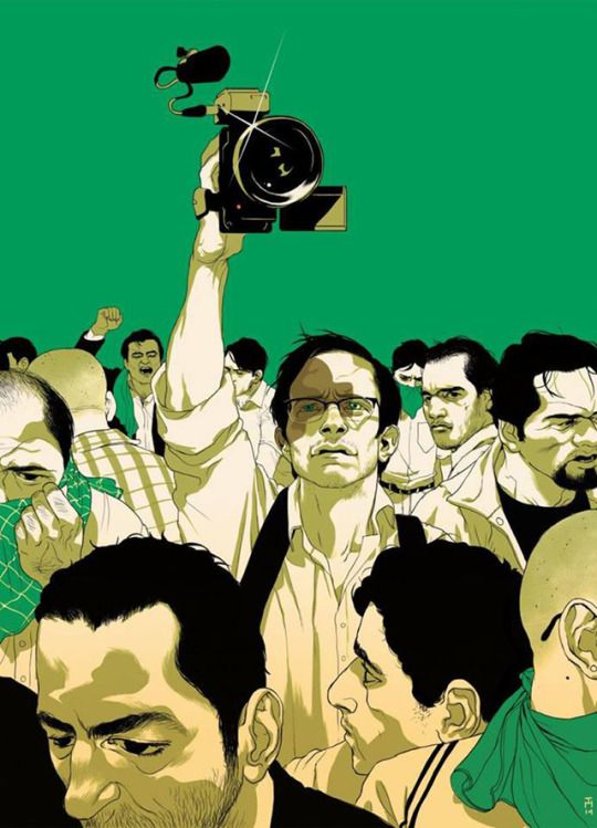 a group of men standing next to each other in front of a green background with a camera