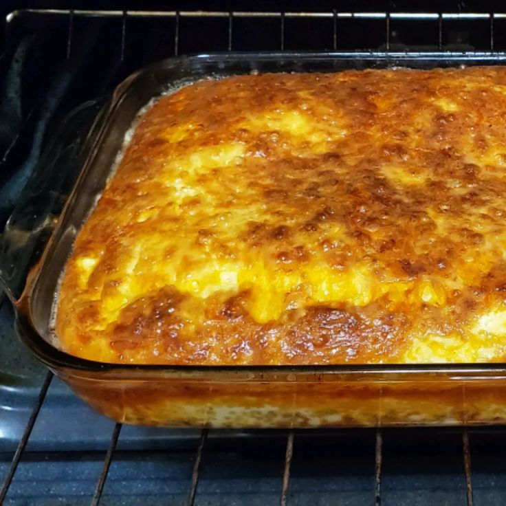 a casserole dish is cooking in the oven