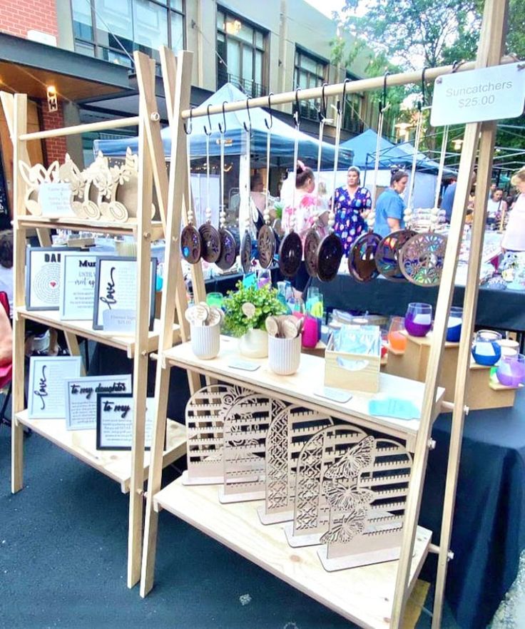 an outdoor market with various items for sale