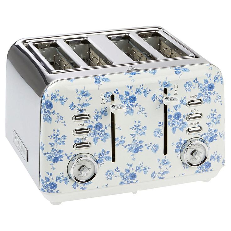 a blue and white flowered toaster with four slices on the top, sitting in front of a white background