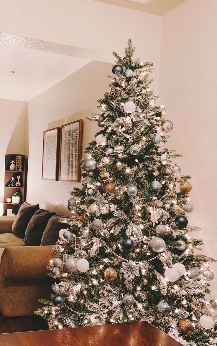 a decorated christmas tree in a living room