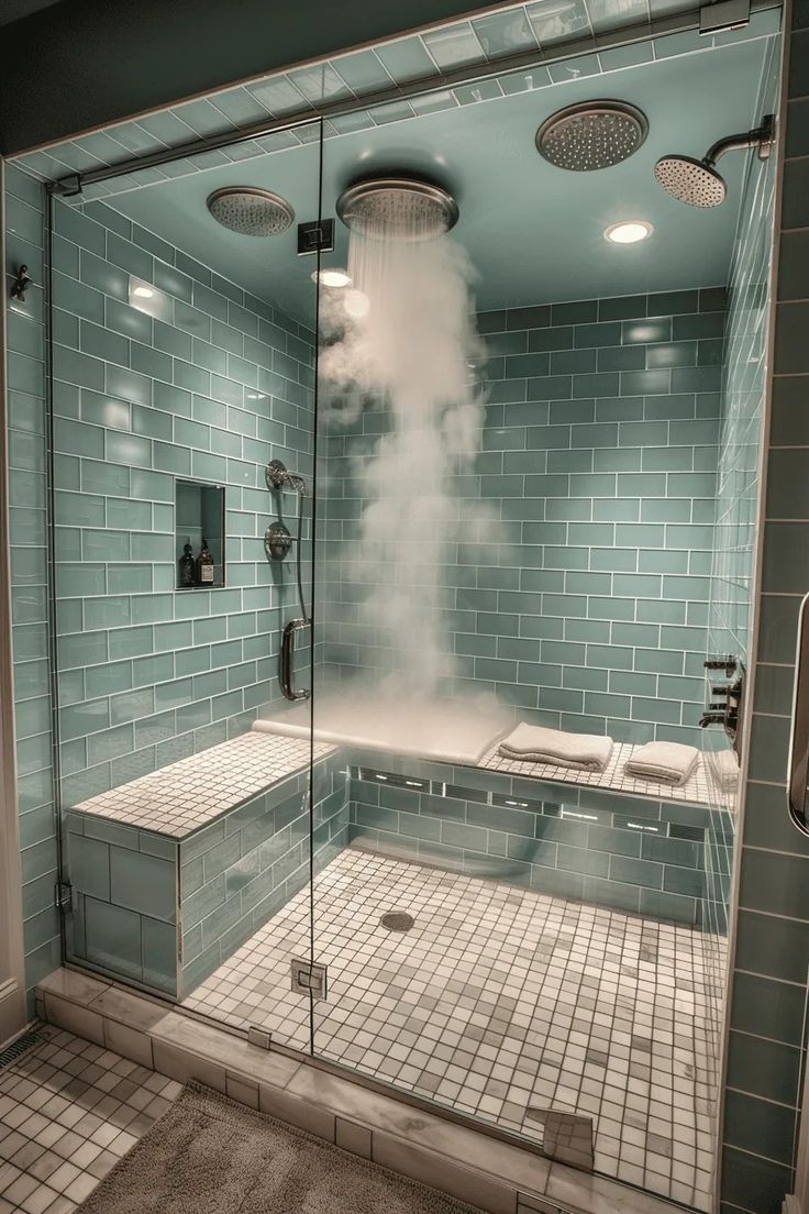 a large steam bath in a bathroom next to a walk in shower