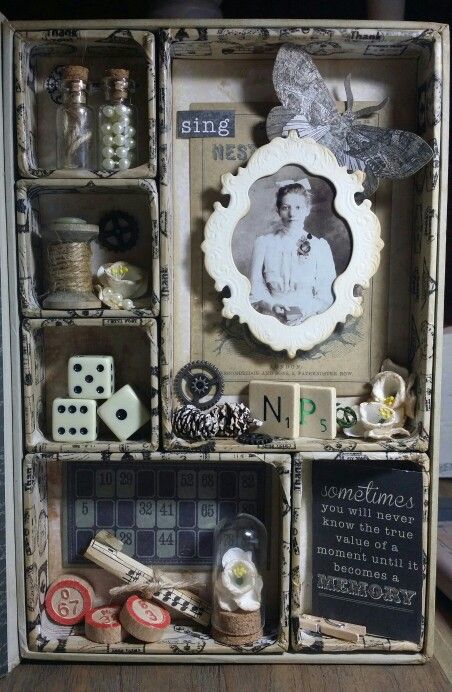 an altered photo with buttons and magnets on it's display case is shown