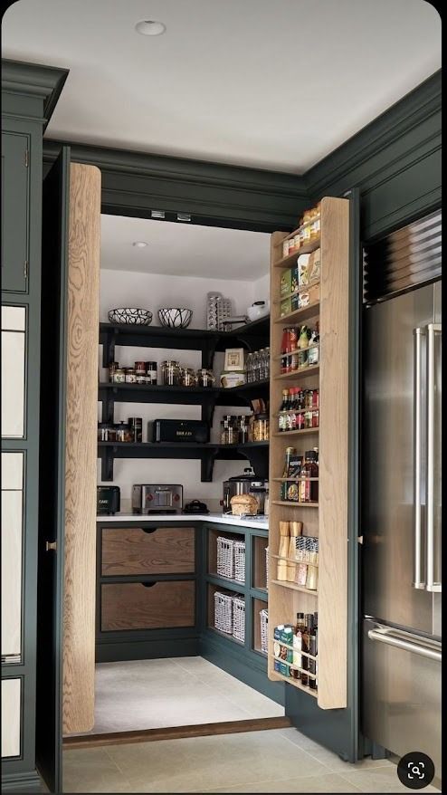 an open pantry in the middle of a kitchen