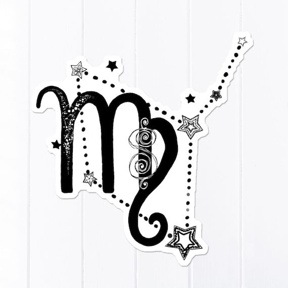 the letter m is made up of stars and swirls on a white wood background