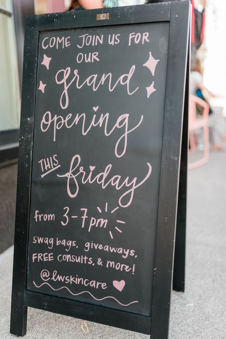 a chalkboard sign with writing on it that says grand opening friday 3pm - 3pm