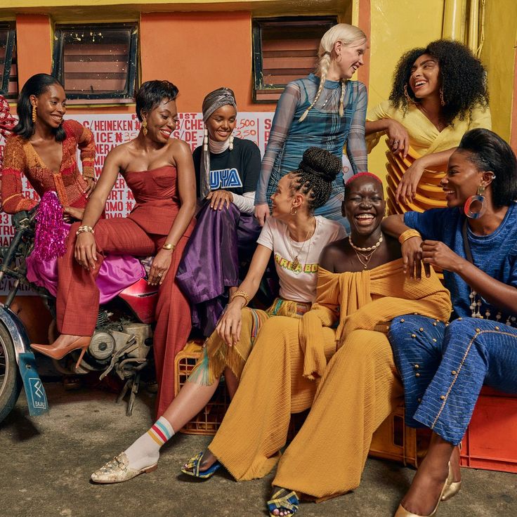 a group of women sitting next to each other