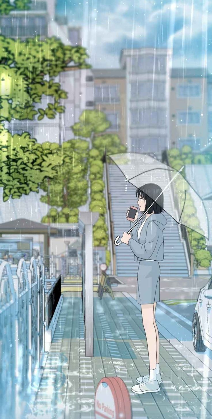 a woman holding an umbrella in the rain