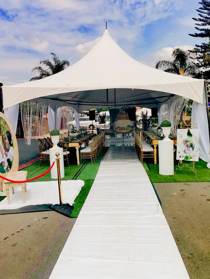 a white tent set up for an outdoor event