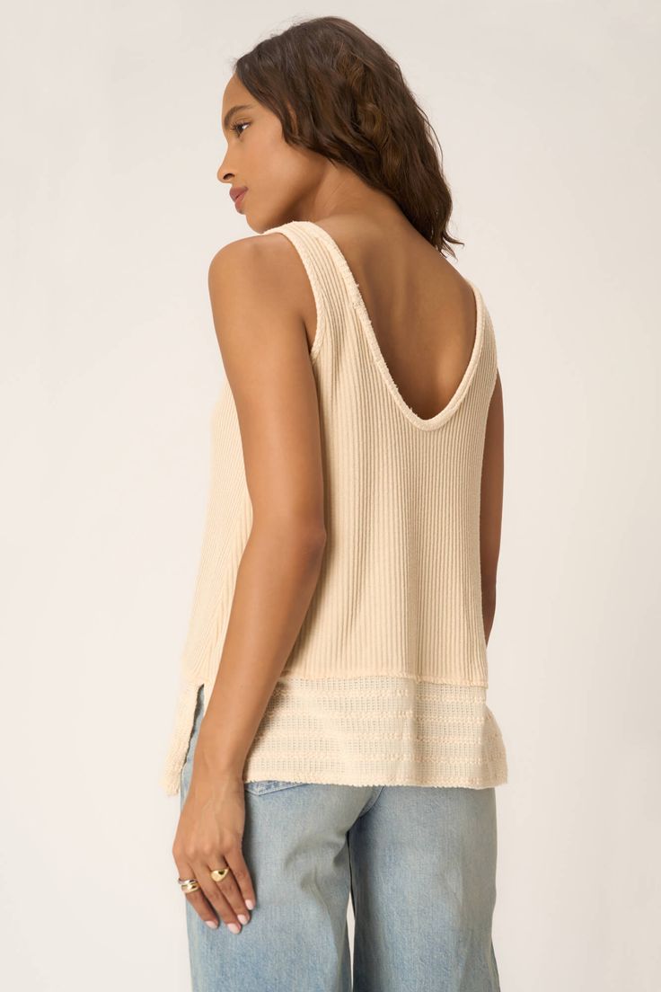 Only accepting weekend vibes moving forward.The Weekend Vibes Sweater Rib Tank is your new warm-weather BFF. It features a delicate knit fabric and a relaxed, long-line silhouette that is perfect for styling an easygoing look. A scoop neckline, side slits, and exposed seaming throughout add extra little details that will make this a style favorite this season. 46% Polyester45% Rayon7% Spandex Care Instructions: Machine wash cold. Wash inside out with similar colors. Do not bleach. Lay flat to dr Everyday Ribbed V-neck Knit Top, Relaxed Cotton Top With Soft Texture, V-neck Pointelle Knit Tops For Loungewear, Comfortable Relaxed Fit Knit Tops, Comfortable Knit Tops With Relaxed Fit, Chic Soft Knit Top With Relaxed Fit, Relaxed Fit Soft Knit Top For Day Out, Soft Knit Relaxed Fit Tops For Day Out, Sleeveless Knit Top For Fall Loungewear