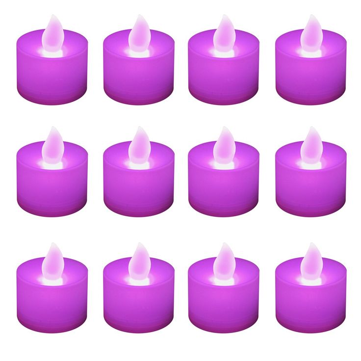 many purple candles with white lights on them