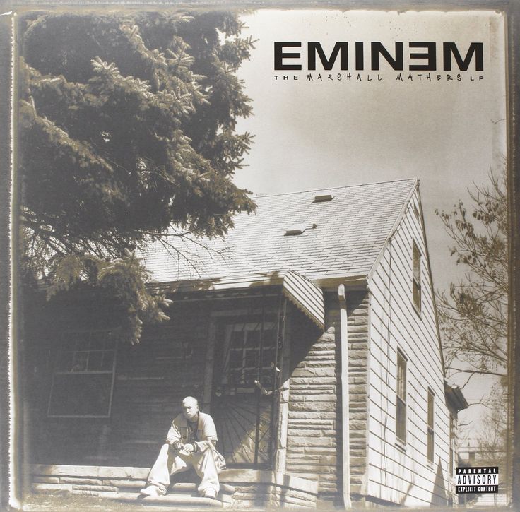 an album cover with a man sitting in front of a house