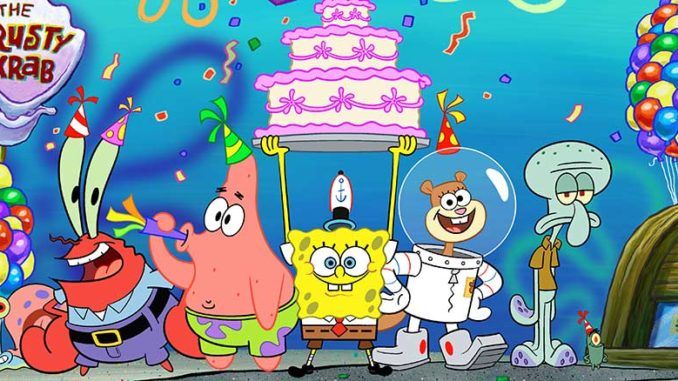 cartoon characters standing in front of a birthday cake