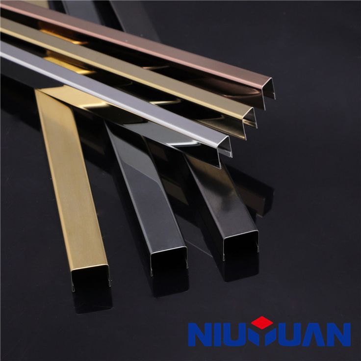 several different types of metal profiles on a black surface