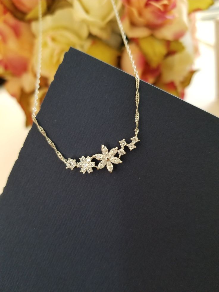 "CZ Necklace, Cubic Flower Necklace, Flower pendant, Spring jewerly/ Flower Girl gift/ everyday jewelry ✦ Pendant cubic zirconia,16K gold plated - Size:30x11mm including links ( flower) ✦ Gold Figaro Chain, Rhodium Figaro Chain ✦ Length: The length is 16\"+2.5\" extender chain ✦ Beautifully gift wrapped in a gift box with a ribbon." Raw Stone Bracelet, Family Tree Bracelet, Flower Girl Necklace, Grandmother Jewelry, Mothers Bracelet, Girl Necklace, Gift Valentines Day, Wedding Pendant, Natural Stone Earrings