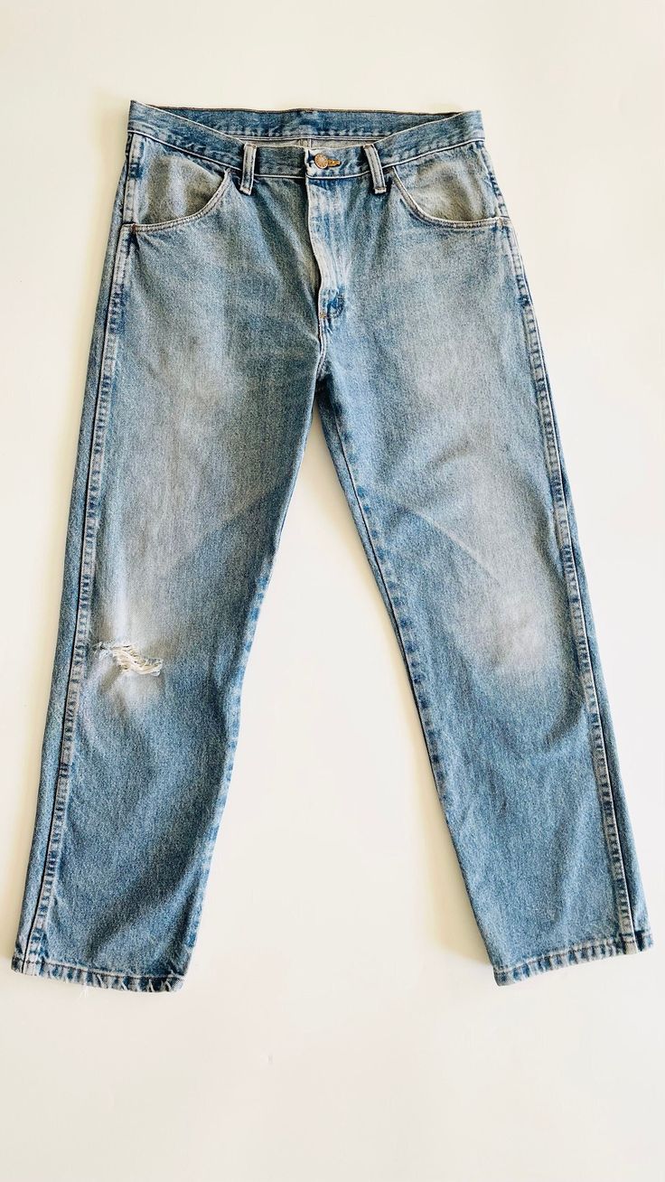 Natural waist, 4 pocket, non stretch jeans. Great vintage wear and fading. 100% cotton.  Waist: 16.5" Hips: 21" Rise: 11" Inseam: 29" Hem: 8" Distressed Medium Wash Rigid Denim Jeans, Faded Distressed Denim Cropped Jeans, Light Wash Pre-washed Cotton Jeans, Fitted Pre-washed Blue Jeans, Distressed Dark Wash Cropped Jeans In Rigid Denim, Pre-washed Straight Leg Denim Blue Jeans, Pre-washed Recycled Denim Blue Jeans, Distressed Straight Leg Washed Blue Jeans, Distressed Medium Wash Cropped Rigid Denim Jeans