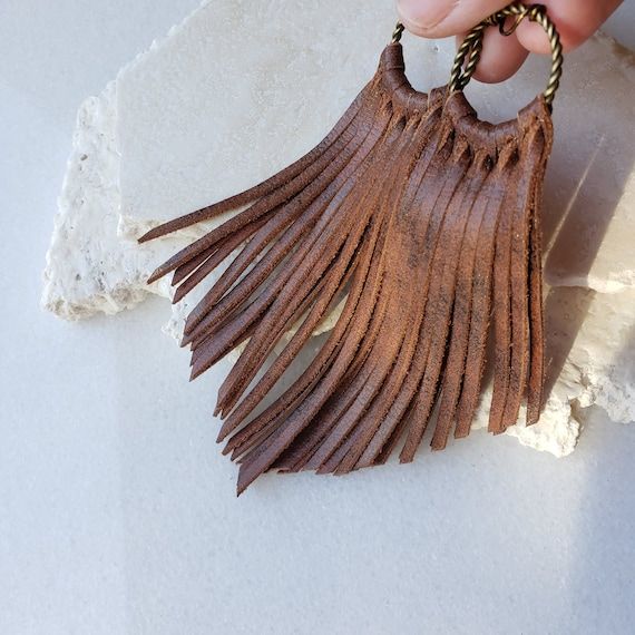 Leather Jewelry Happygolicky Jewelry, Trendy Cheap Leather Jewelry, Cheap Leather Dangle Jewelry, Knot Leather Earrings, Indiana Leather Earrings, Affordable Trendy Leather Jewelry, Boho Western Leather Earrings, Cheap Fringe Jewelry Gift, Leather And Concho Earrings