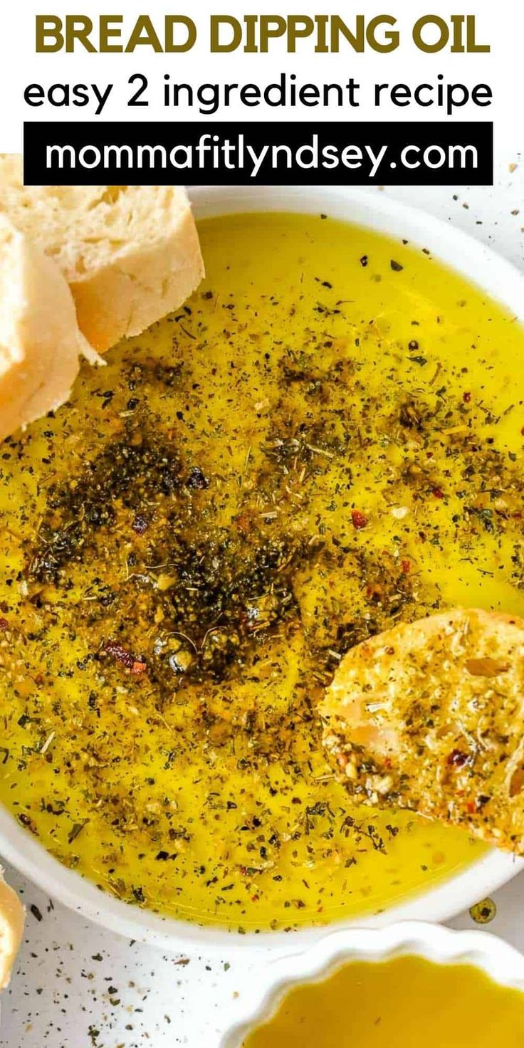 bread dipping oil in a white bowl with the words, homemade bread dipping oil easy 2 ingredient recipe