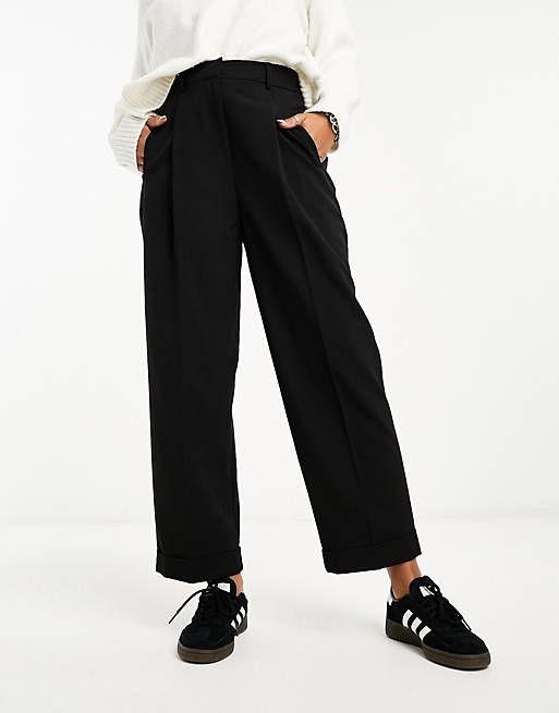 ASOS DESIGN tapered pants with turn up hem in black  | ASOS Business Casual With Black Sneakers, Converse With Slacks, Sporty Corporate Outfit, Corporate Casual Women Office Wear, Relaxed Fit Workwear Pants With Rolled Hem, Relaxed Fit Rolled Hem Pants For Workwear, Relaxed Fit Pants With Rolled Hem For Workwear, Classic Rolled Hem Bottoms For Workwear, Classic Bottoms With Rolled Hem For Workwear