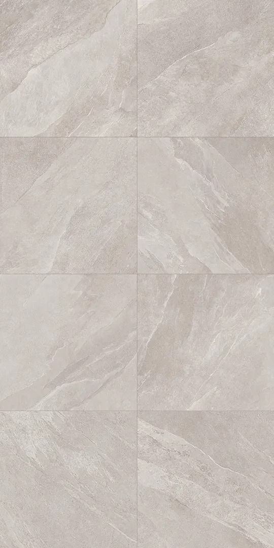 a white marble tile floor with grey lines