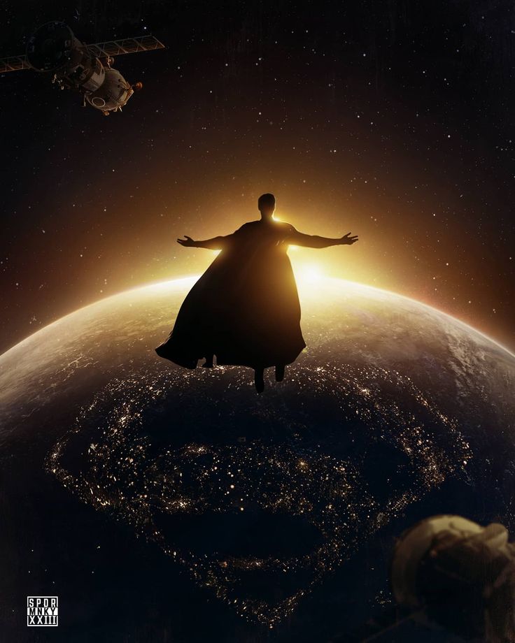 a man standing on top of the earth with his arms outstretched in front of him