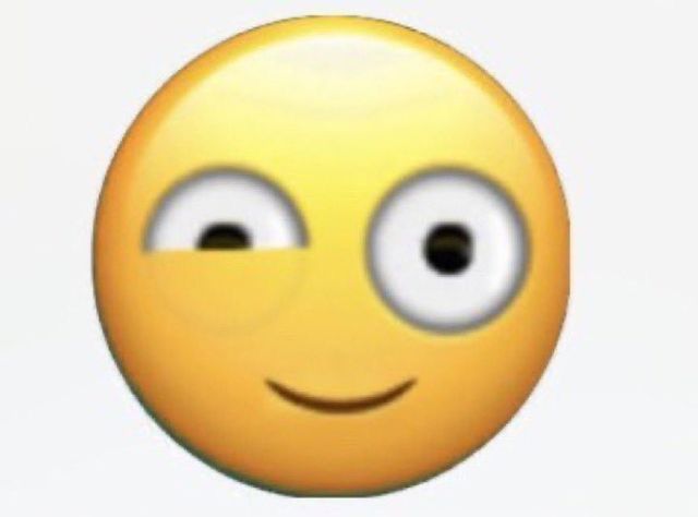 an emoticive smiley face with one eye wide open and two eyes wide closed