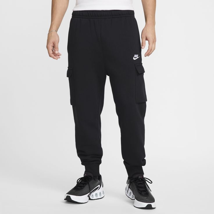 The Nike Sportswear Club Fleece Cargo Pants put an athletic spin on the classic cargo style. Made from soft brushed fabric, they're comfortable for all-day wear. Sporty Cargo Pants With Ribbed Cuffs For Streetwear, Nike Athleisure Cargo Pants With Cargo Pockets, Nike Cargo Pants With Cargo Pockets Athleisure Style, Nike Functional Cargo Pants With Pockets, Nike Functional Cargo Pants For Sports, Nike Functional Cargo Pants With Side Pockets, Nike Cargo Pants With Side Pockets For Sports, Functional Nike Cargo Pants With Pockets, Nike Sporty Cargo Pants With Pockets