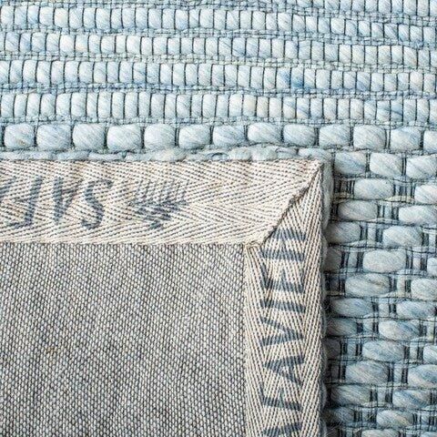 an upholstered piece of fabric with the word love written on it, in blue and white