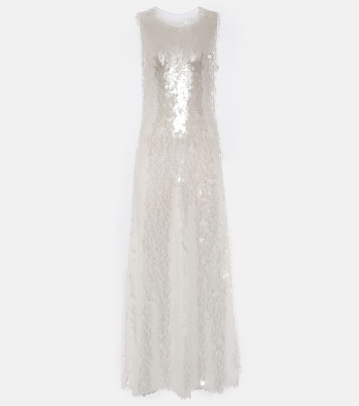 a white dress with sequins on it