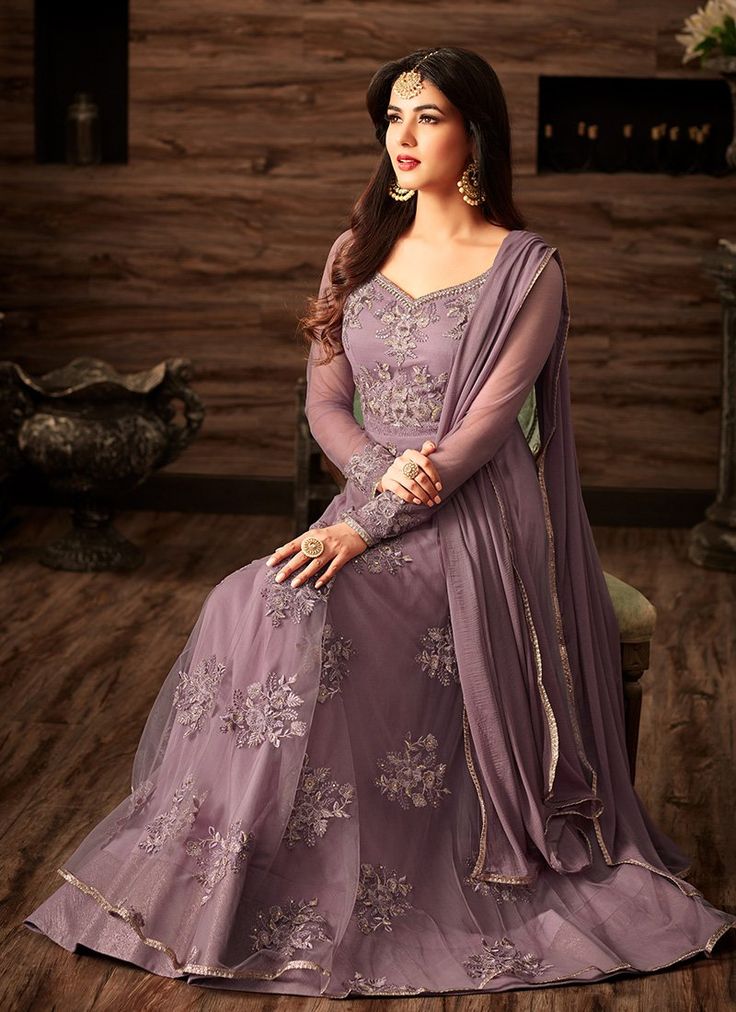 Lavender Embroidered Net Anarkali features a net anarkali with santoon inner embroidered with thread and sequins embellishments alongside a santoon bottom and chiffon dupatta. Net Anarkali, Sonal Chauhan, Designer Anarkali Dresses, Designer Anarkali Suits, Gaun Fashion, Designer Anarkali, Indian Gowns Dresses, Indian Gowns, Anarkali Suit