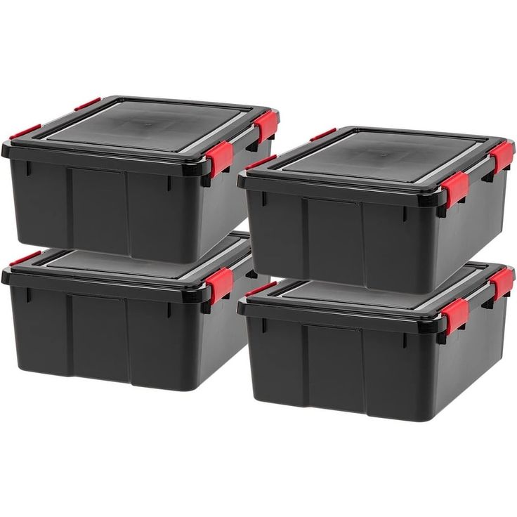 four black plastic storage containers with red handles