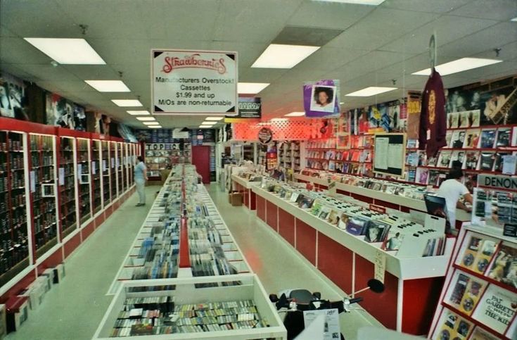 the inside of a store filled with lots of books