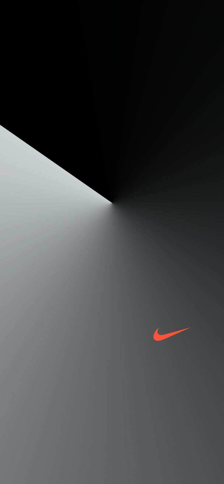 an orange nike logo on a black and white background with light coming from the top