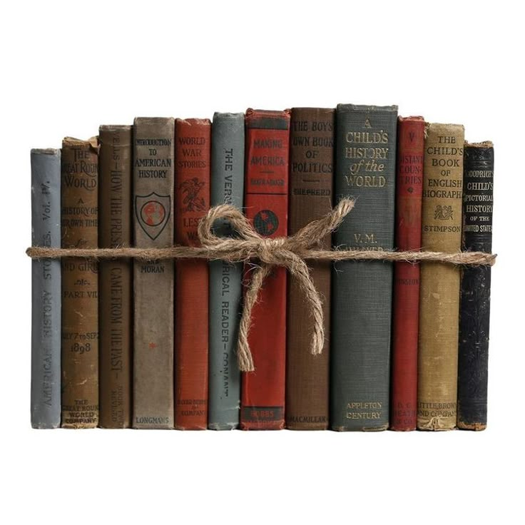 a row of old books tied to a rope