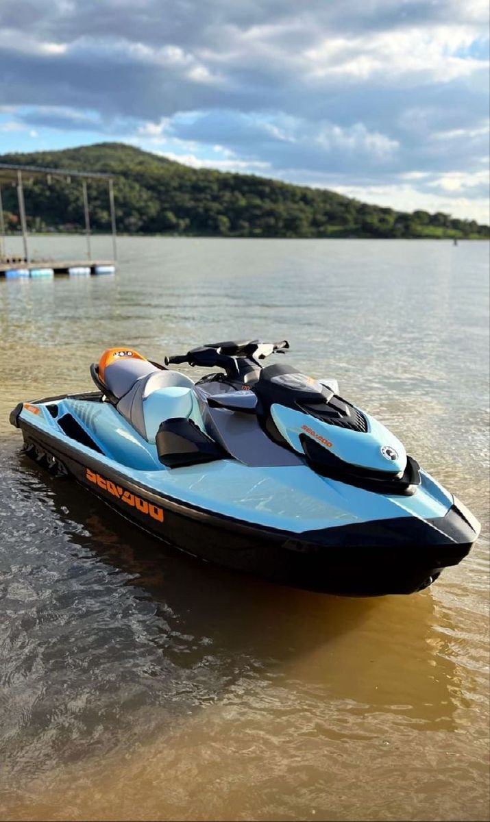 a blue and black jet ski in the water