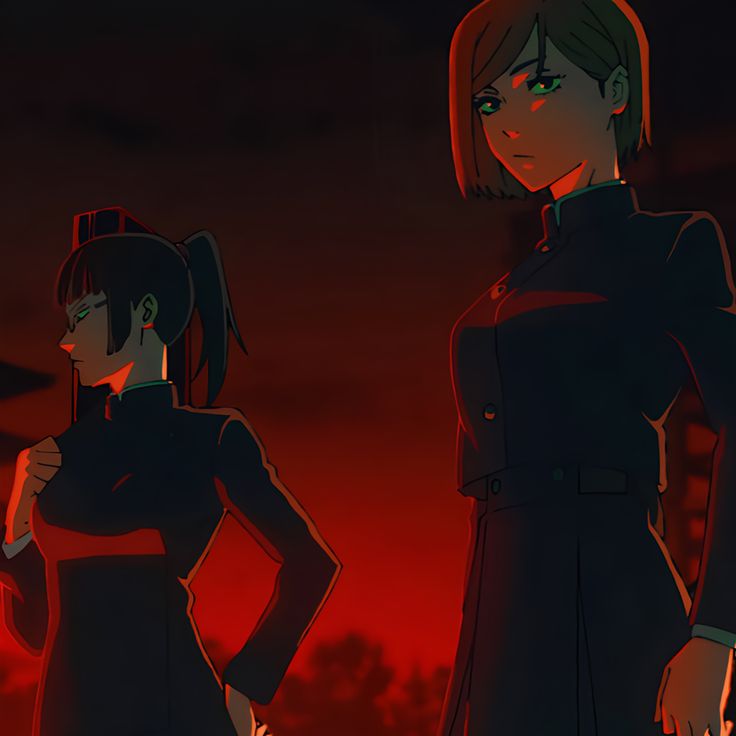 two anime characters standing next to each other in front of a red sky at night