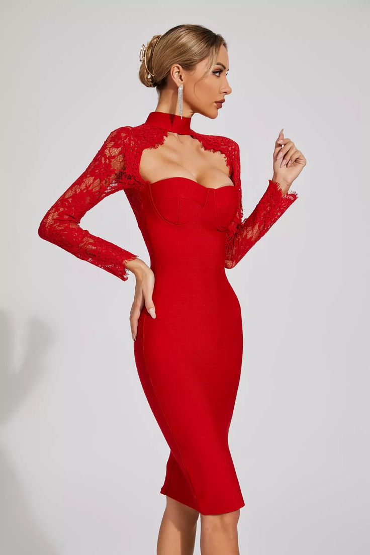 a woman wearing a red dress with long sleeves and lace detailing on the neckline