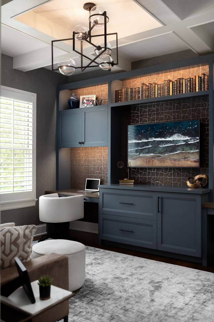 a living room filled with furniture and a flat screen tv