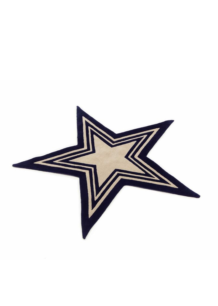 a black and white star shaped object on a white background