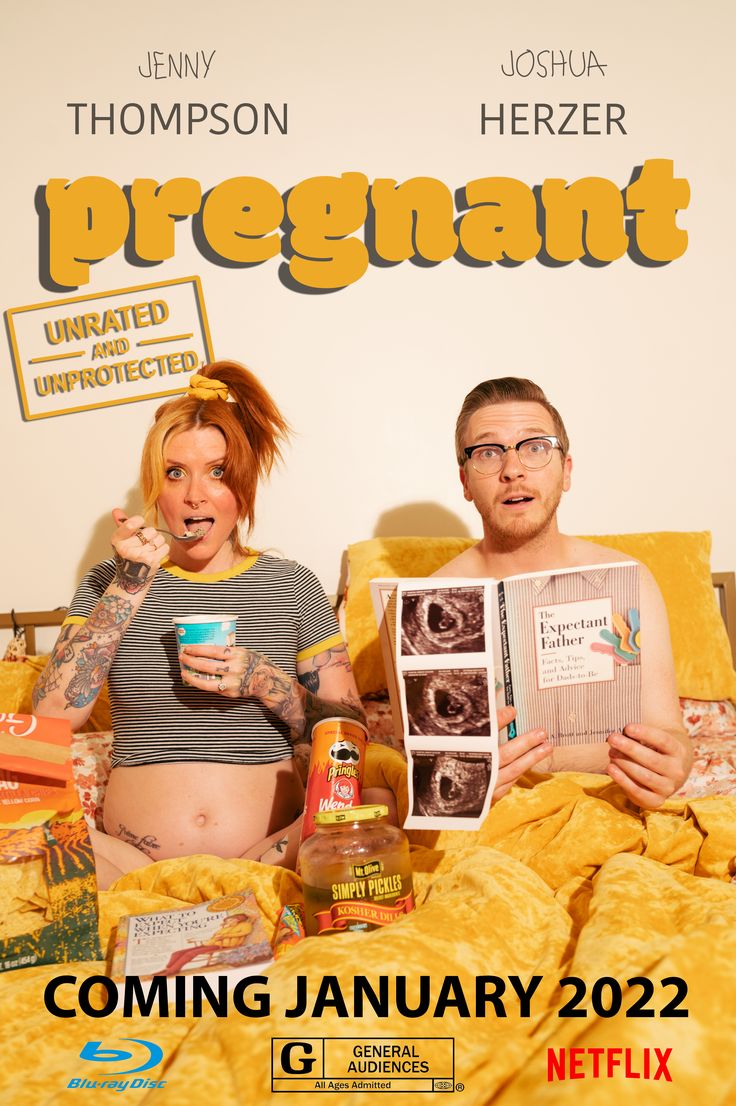 a pregnant woman and man sitting on a bed in front of a poster for the upcoming movie, pregnant