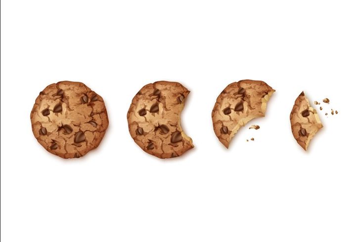 three pieces of chocolate chip cookies with one broken in half