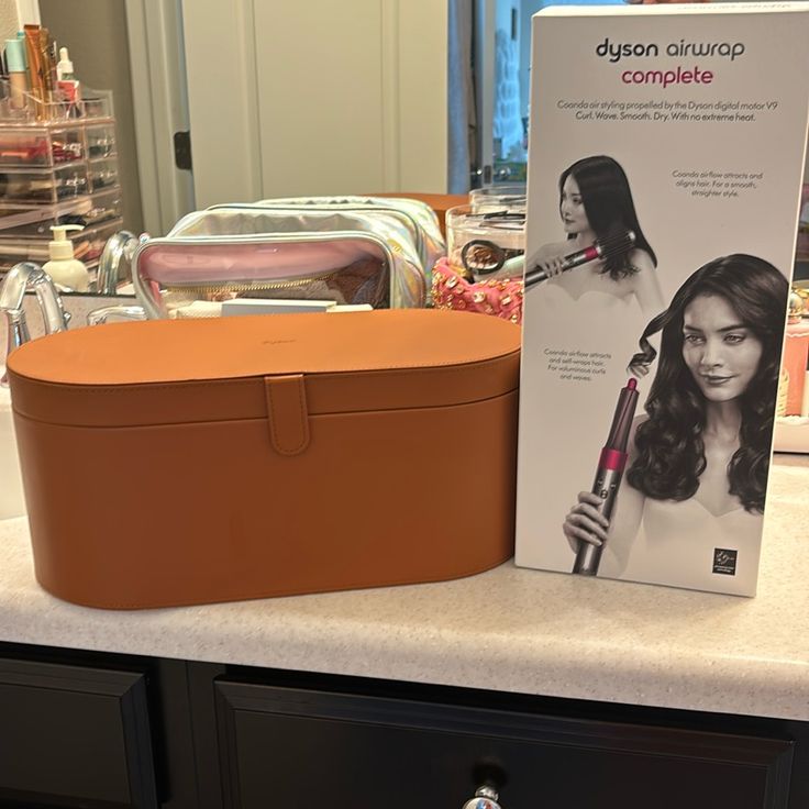 Dyson Air Wrap Complete Hair Set Comes With Everything Shown In Original Box And With The Leather Storage Case Secured With A Magnetic Clasp. This Set Does It All! I Have Used The Blow Dryer Attachment And The Paddle Brush Attachment Only. The Other Attachments Are Untouched. The Blow Dryer Attachment Has Some Chips Around The Corner. Please See Photo, It Does Not Negatively Impact It Though. Dyson Air Wrap, Air Wrap, Hair Set, Paddle Brush, Leather Storage, Hair Setting, Blow Dryer, Storage Case, Magnetic Clasp